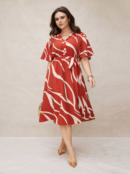 Rochie midi cu nod și nod la gât și imprimeu geometric