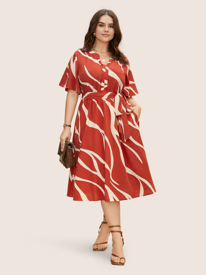 Rochie midi cu nod și nod la gât și imprimeu geometric